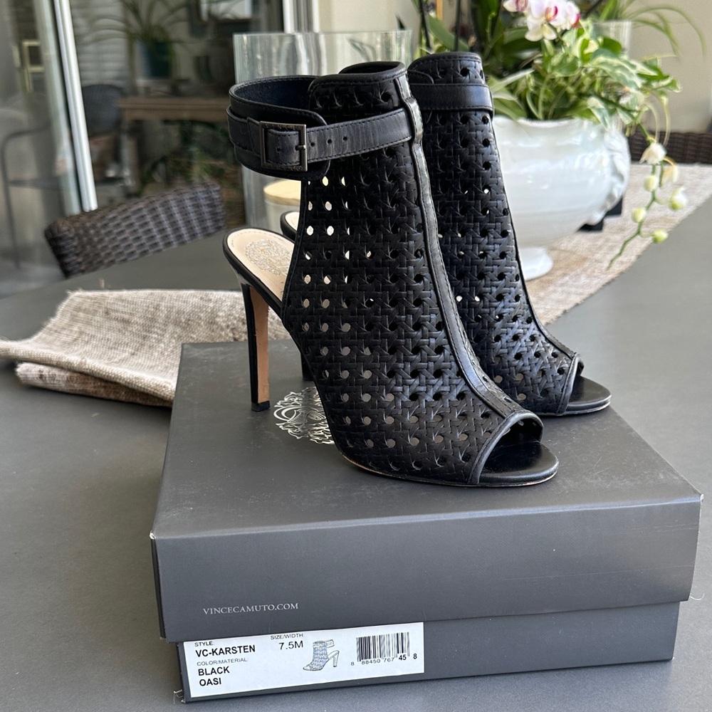 Vince Camuto Black Perforated Peep-Toe Ankle Booties with Buckle. Leather upper